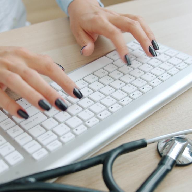 Mobile app project planning workspace with devices and development tools